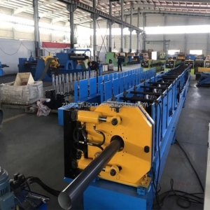 አውቶማቲክ ከፍተኛ ፍጥነት ያለው የውኃ መውረጃ ቱቦ ፓይፕ ሮል መሥሪያ ማሽን የጣሪያ ቁልቁል የቧንቧ ጥቅል ማሽን